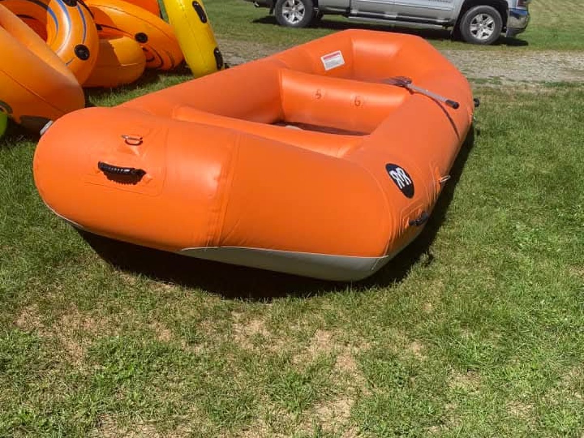 a car parked in a grassy field
